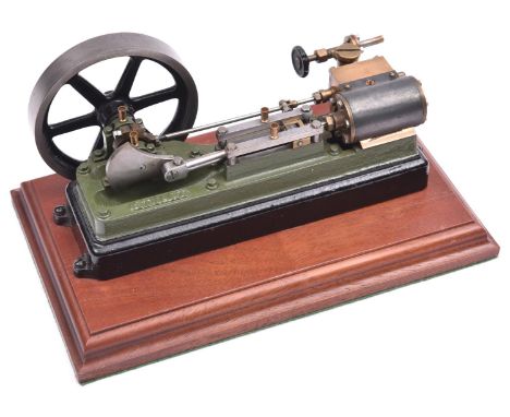 A Stuart Models Mill Engine S50. A small single cylinder engine, approx 220mm long. Finished in green and mounted on a hardwo