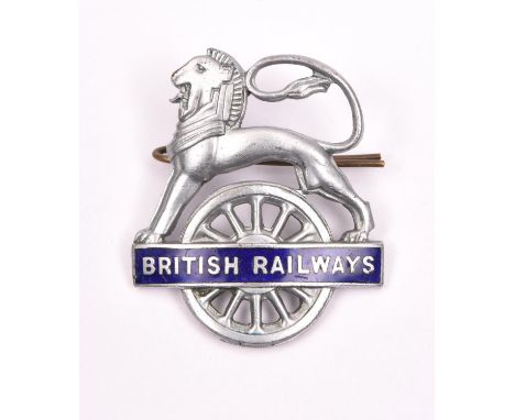 British Railways (Eastern Region) BRITISH RAILWAYS cap badge. Chrome and blue enamel lion over wheel, with 2 lugs to reserve.