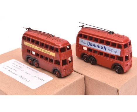 A scarce Taylor &amp; Barrett&nbsp; small size trolley bus hollow cast ,finished in red with black metal wheel and black roof