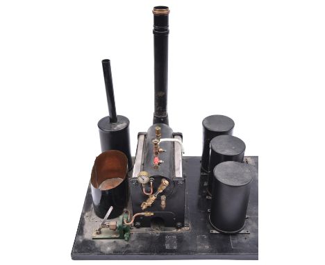 A live steam stationary steam boiler built using some Stuart parts. Fitted with pressure gauge, water sight glass, hand pump,