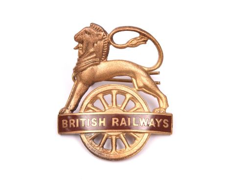 British Railways (Western Region) BRITISH RAILWAYS cap badge. Brass and brown enamel lion over wheel, with 2 lugs to reserve.