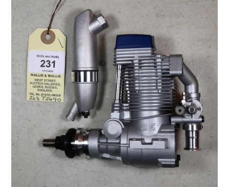 O.S. four stroke model aircraft engine for radio controlled aircraft. Model No. FS 81/34810, with silencer. Made in Japan 200