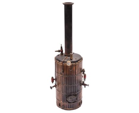 A large and substantial live steam vertical boiler. Wood clad boiler fitted with water sight glass, pressure gauge, safety va