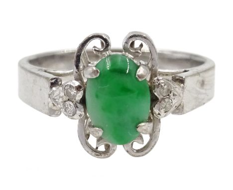 White gold cabochon oval jade and four stone diamond ring, stamped 14K Condition Report 3.3gmsize LClick here for further ima