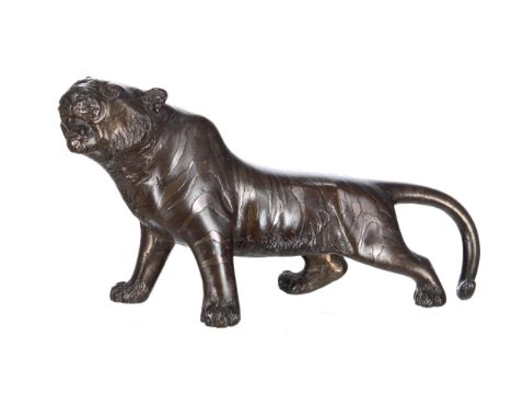Small Japanese bronze figure of a tiger, with a&nbsp;character mark signature to the underside, 6" wide, 3" high 
