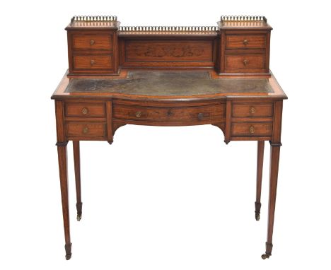 Good Edwardian satinwood and boxwood inlaid desk, the raised gallery back with inlaid foliate scroll panel flanked by two dra