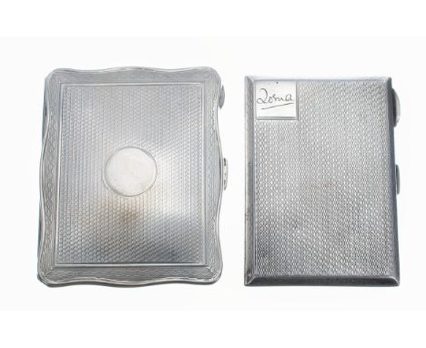 Two silver engine turned cigarette cases, the first of serpentine form, with gilt interior, Birmingham 1923, 3.25" x 2.5"; th