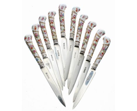 Attractive set of ten porcelain handled fruit knives,&nbsp;with foliate and gilded pistol grips and silver hallmarked blades 