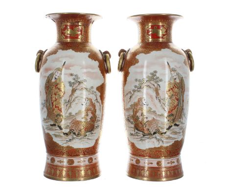 Pair of large Japanese Kutani porcelain vases, decorated with warrior figural panels within gilt close foliate borders on a r