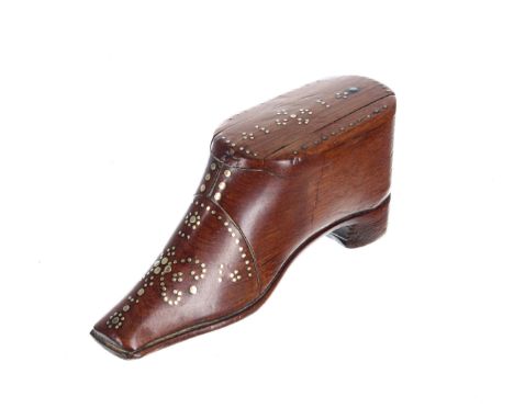 Early 19th century novelty boot snuff box, with slide cover and brass pique decoration to the top and to the sole, 4" wide, 1