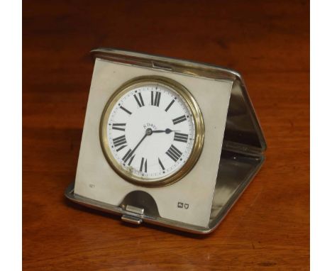 George V folding silver cased travelling eight day clock, within an&nbsp;engine turned cigarette case, Collingwood &amp; Co.,