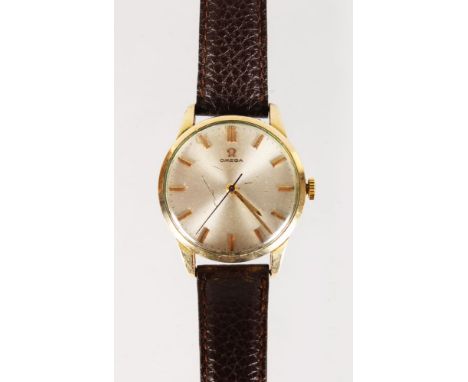 A GENTLEMAN'S VINTAGE OMEGA WRISTWATCH on leather strap.