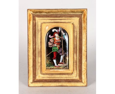 A GOOD 18TH CENTURY LIMOGES ENAMEL PLAQUE OF A SOLDIER holding a pikestaff, monogrammed TS. 5ins x 2.5ins, in a gilt frame.