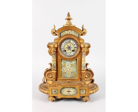 A 19TH CENTURY FRENCH GILT METAL AND CHAMPLEVE ENAMEL CLOCK, with eight-day movement, column supports, acanthus with champlev