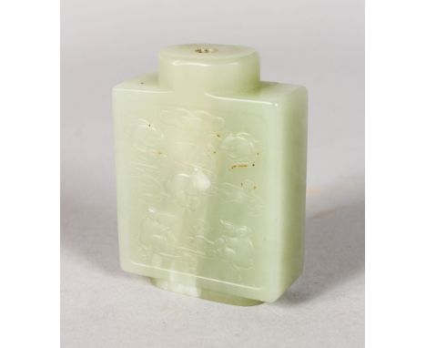 A CHINESE JADE SNUFF BOTTLE, carved with calligraphy.