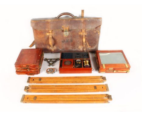 AN EARLY LEATHER CASED MAHOGANY PLATE CAMERA with four plates on a tripod stand in three pieces, with ROSS of LONDON, 8.5ins 