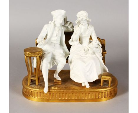 A 19TH CENTURY SEVRES WITH PORCELAIN GROUP OF A MAN AND WOMAN, sitting on an ormolu sofa with stool and table. 8ins high.