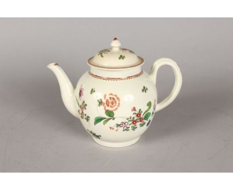 AN 18th CENTURY LIVERPOOL TEAPOT AND COVER painted with flowers.