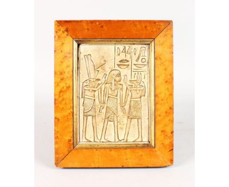 AN EGYPTIAN STYLE PLATED PANEL, 8ins x 5.5ins, in a maple wood frame.