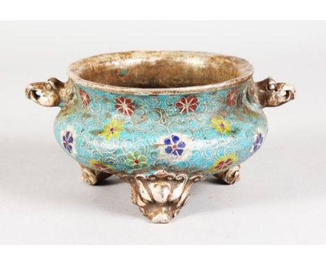 A CHINESE CLOISONNE ENAMEL CIRCULAR CENSER with animal handles and three feet. 5ins diameter.
