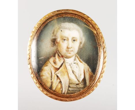 ENGLISH SCHOOL, CIRCA. 1765 A GOOD SMALL OVAL PORTRAIT MINIATURE OF A GENTLEMAN with powdered hair and wearing a brown coat a