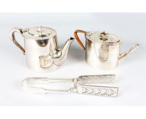 A GEORGIAN STYLE OVAL TEAPOT with raffia covered handle, a teapot and a pair of asparagus servers (3).