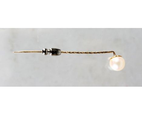 A GOLD AND PEARL STICK PIN.