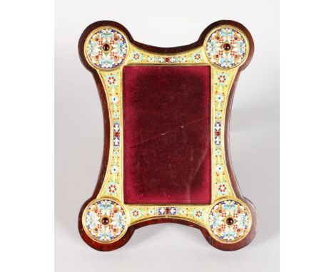 A GOOD RUSSIAN SILVER AND ENAMEL EASEL PHOTOGRAPH FRAME on a wooden frame. 9.5ins high, 7ins wide.