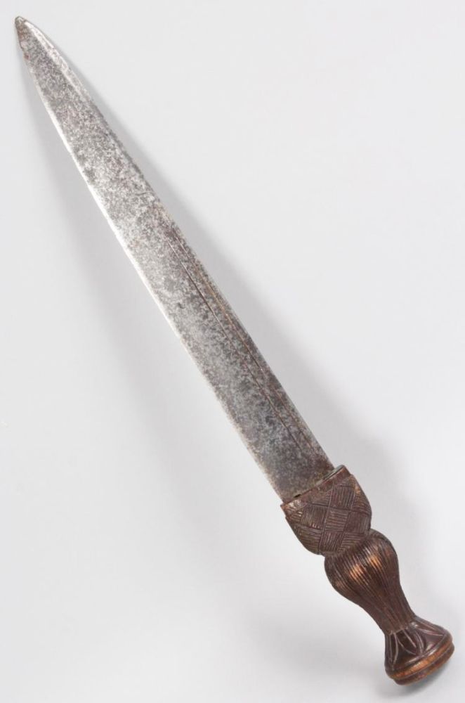 A SCOTTISH DIRK, back-edged blade with two narrow fullers, wood grip ...