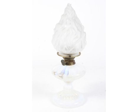 A 19th century opal striped vaseline glass oil lamp. The shade of frosted white glass (damaged to top) in the form of flames.