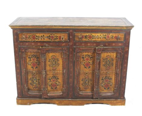 A circa 1900 hardwood Eastern European painted sideboard. With hand painted and stencil floral decoration. Two drawers over t