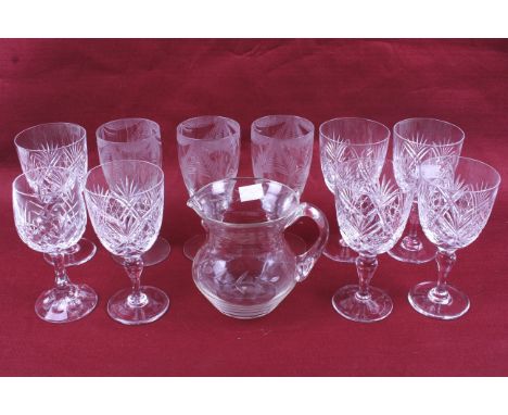 A group of ten assorted vintage crystal glasses and a jug. Including six Thomas Webb signed lead crystal 'St Andrews' design 