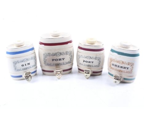 A group of four assorted vintage Wade Pottery drinks barrels. Including Port, Gin and Sherry. Max. H15cm