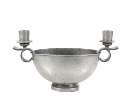 An early 20th century Swedish pewter mounted dish designed by Edvin Ollers. Of broad cup shape with either end supporting a s
