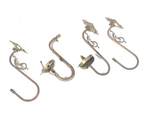 Set of three Victorian brass and copper gas wall light brackets and another. Of 'S' shape form with brass diamond shaped brac