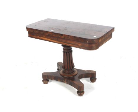 A George IV rosewood fold over card table. 72cm H, 90cm W, 92cm D, with Gillows style columnCollection from Ston Easton Park 
