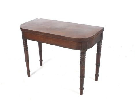 Early 19th Century mahogany dark inlaid fold over top card table.  Having turned taping supports, baize has been removed. Ope