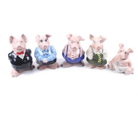 A full set of five vintage Wade Natwest china piggy banks money boxes. Max. H18cm 