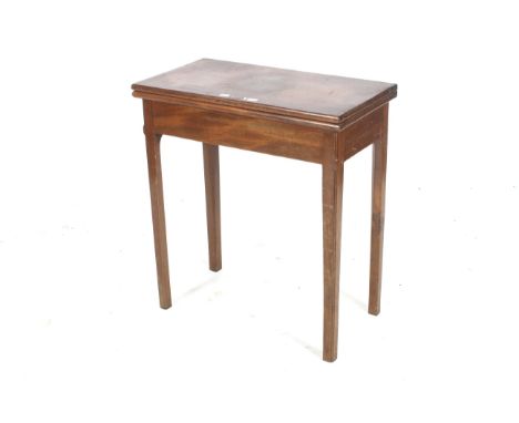 A 19th century mahogany fold over card table, 72cm H, 65cm W, 35 D, with green based lining, drink stands and counter wellsCo