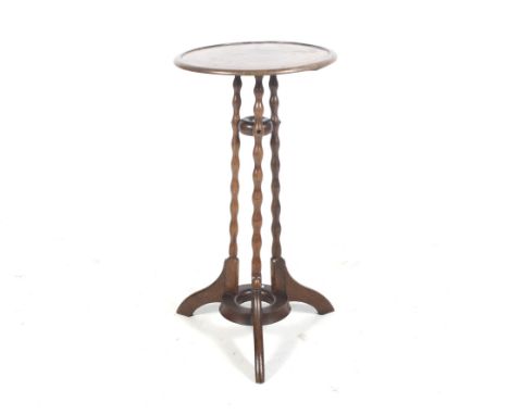 A circa 1900 walnut circular tripod wine table. With bobbin-like turning to the triple pedestals, H72cm x Diam 37.5cm
