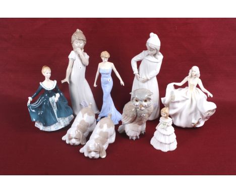 Eight porcelain figures. Comprising a Nao figure of a girl in a nightdress, an owl and two puppies, four Royal Doulton figure