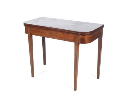 A late 18th century fold over mahogany card table. 74cm H, 94cm W, 92cm D, with brass inlayCollection from Ston Easton Park H
