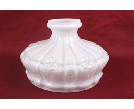 An early 20th century white moulded glass lamp shade. Of circular form with textured and ribbed decoration. Diameter 25cm
