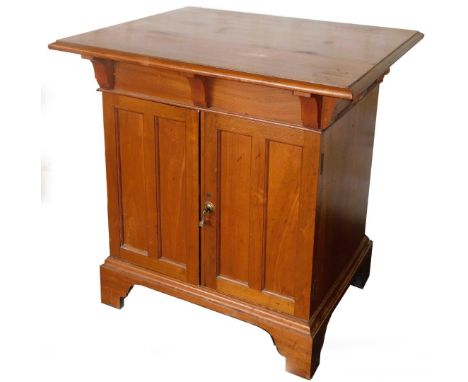An early 20thC walnut cabinet, with two front panelled doors, revealing a plain interior, on ogee bracket feet, 79cm H, 73cm 
