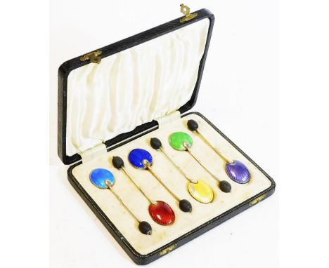 A set of six silver and enamel bean spoons, to include dark blue, light blue, etc. with bean tops, 9cm H, in fitted case.  (6