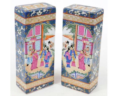 Two Chinese porcelain porcelain incense stick holders, of rectangular form decorated with mirror image panels of courtiers, b