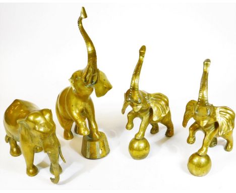 Various brass ware, an elephant with trunk raised, 46cm H, further elephants, pair with feet on orbs, etc. (a quantity)  