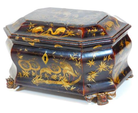 A 19thC Japanned papier mache tea caddy, of octagonal form set with exotic birds and flowers, with interior pewter sections, 