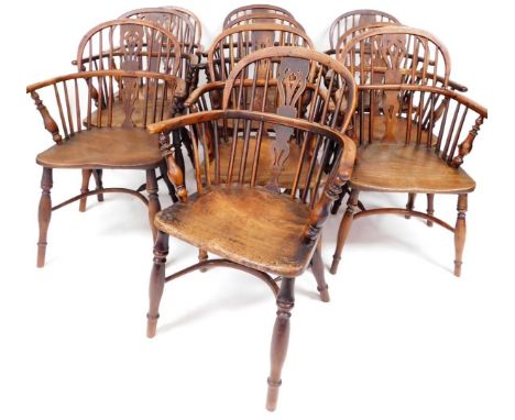 A Harlequin set of ten 19thC low back yew and elm Windsor chairs, each with pierced Nottinghamshire style splats, shaped seat