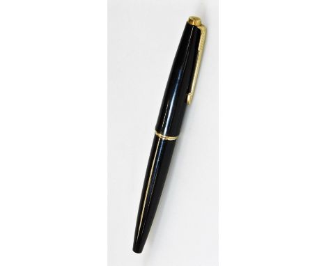 A Parker 50 fountain pen, in black with gilt banding and arrow clip, with gilt coloured section to the lid, partially enclose